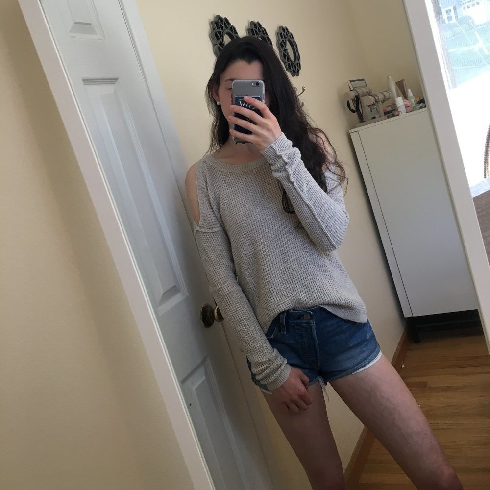 cream sweater with shoulder cut outs